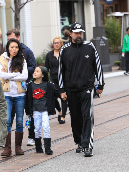 Toshimi, Peter, and their daughter on casual outfits
